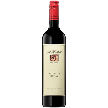 Red wine bottle with a visible label on a white background